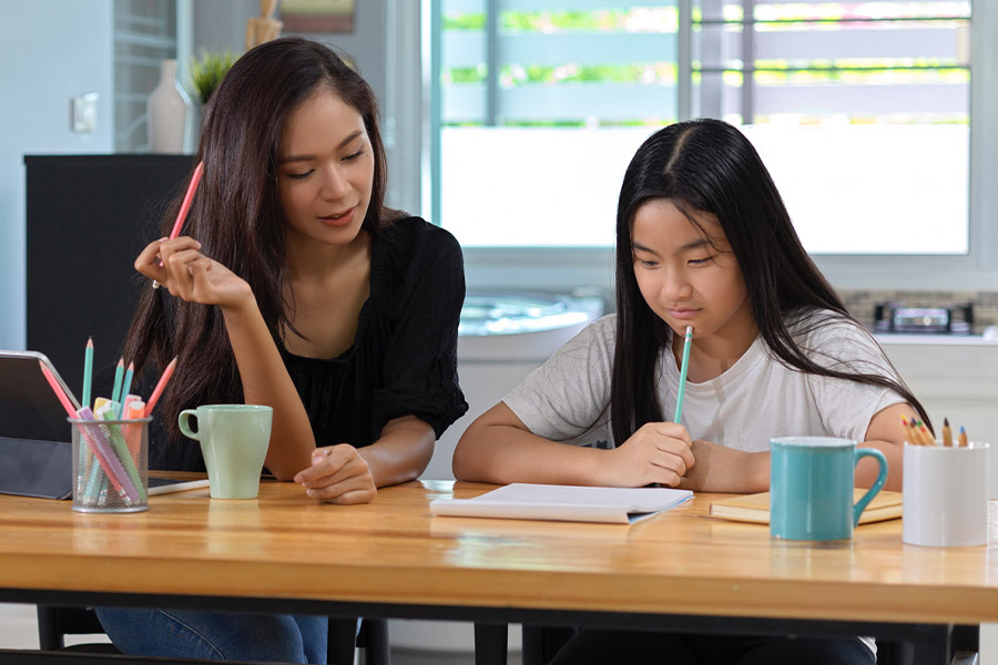 student and tutor together at a desk in Orlando